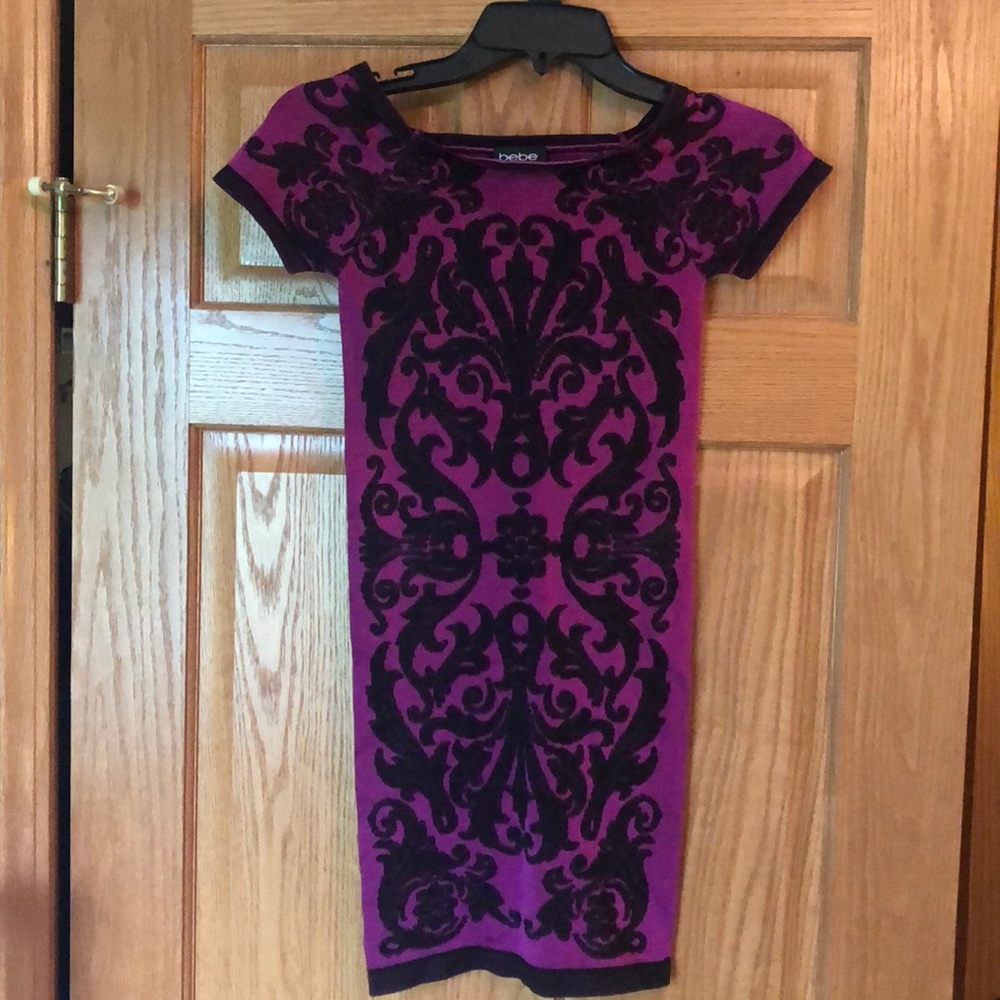 Bebe bodycon jacquard patterned cap sleeve dress.